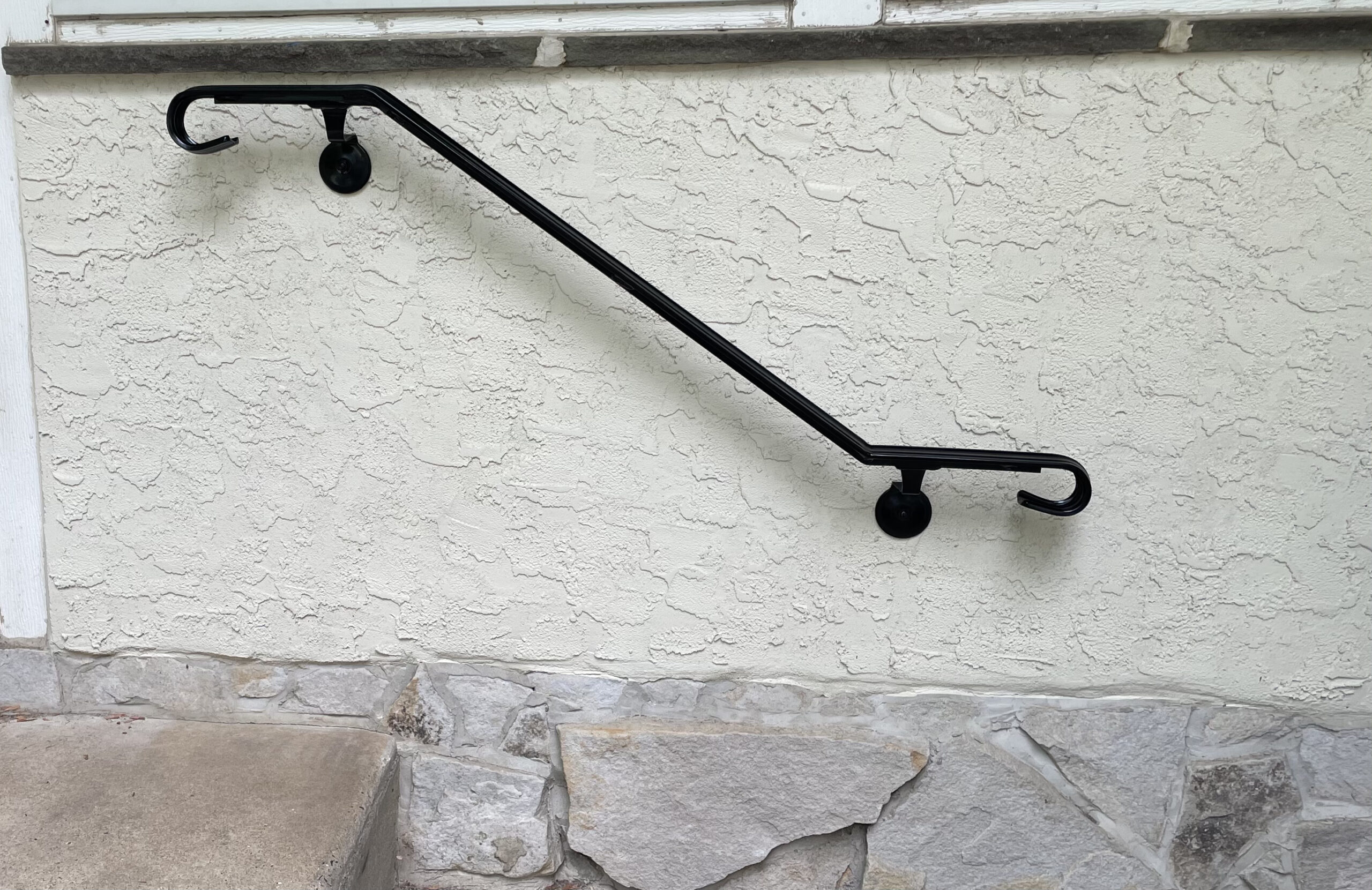 Grab rail with moulded top